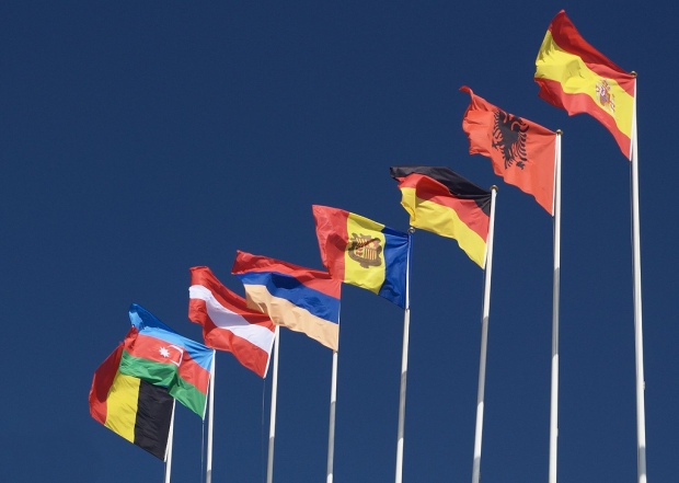 'Flags on the Olympic Stadium in Barcelona' by Martin Pilat on Flicr